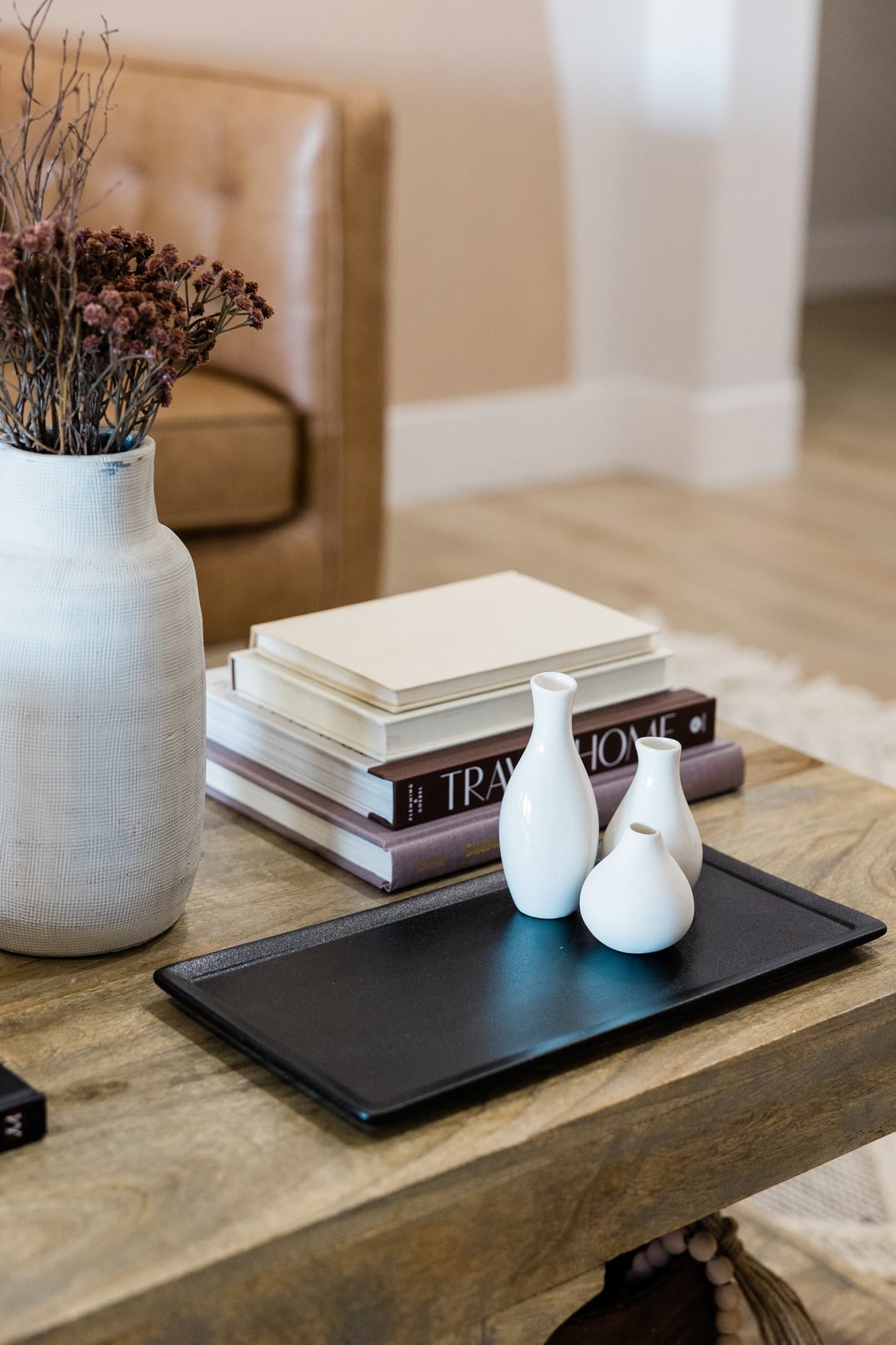 Vase, Books, and Decorative Jars on the Coffee Table